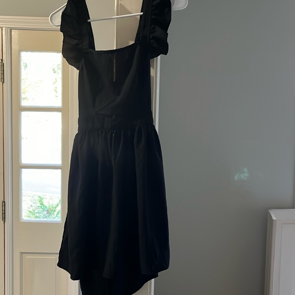 Short black open back with tie dress. Size xs